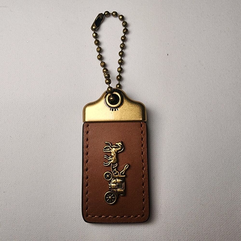 Coach 1941 Horse Carriage Hang Tag Bag Charm - Brass Saddle Multi